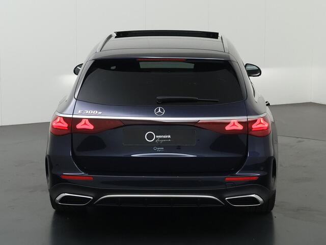 Mercedes-Benz E-estate 300e Sport Edition | AMG | Panoramaschuifdak | Trekhaak | 360° camera | DIGITAL Light | Superscreen | 20" AMG velgen | Stoelverwarming voor |