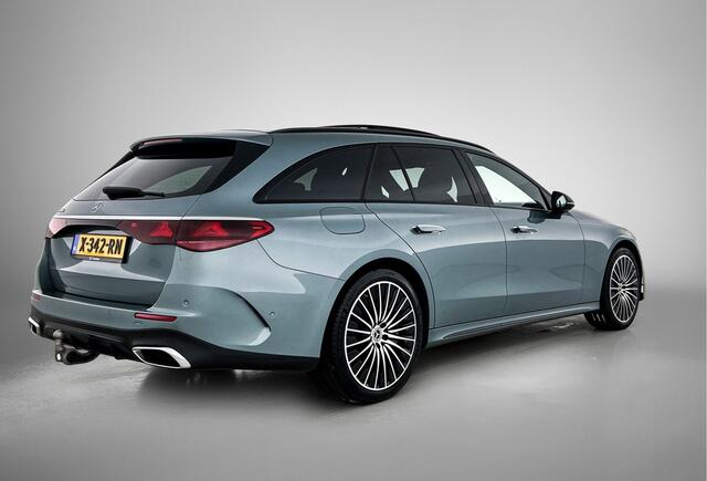 Mercedes-Benz E-estate 300 e AMG Line Trekhaak | Widesreen Cockpit | Multiespaaks 20 ionch AMG wielen | Panoramadak | AMG Styling Inclusief 24 maanden Mercedes-Benz Certified garantie voor Europa.