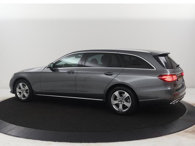 Mercedes-Benz E-estate 200 d | Half Leder | Trekhaak | Camera | Adaptive cruise | Sfeerverlichting | Park assist | Navigatie | Full LED |