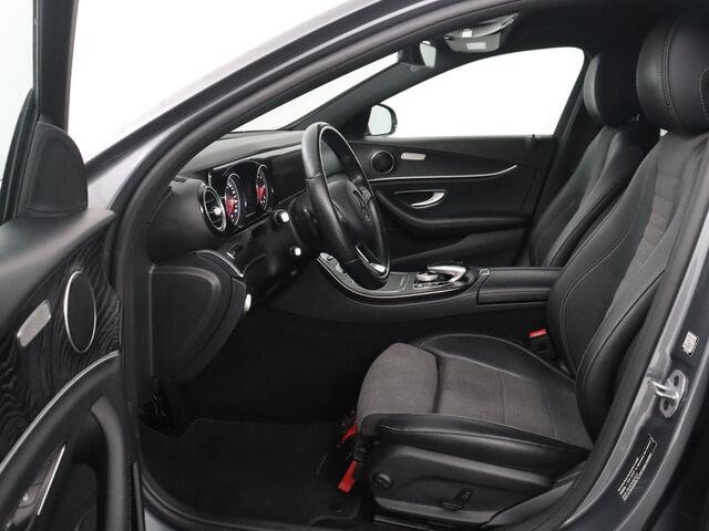 Mercedes-Benz E-estate 200 d | Half Leder | Trekhaak | Camera | Adaptive cruise | Sfeerverlichting | Park assist | Navigatie | Full LED |