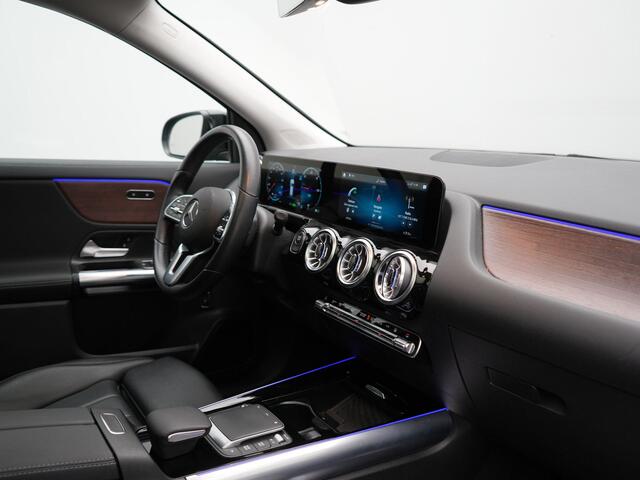 Mercedes-Benz EQA 350 4MATIC Luxury Line 69,7 kWh 292pk Dealer O.H. | Panodak | Adaptive Cruise | Camera | Lederen Sportstoelen Ventilatie & Verwarmd | Sfeerverlichting | Keyless | Blis | Navigatie | DAB | 20"L.M |