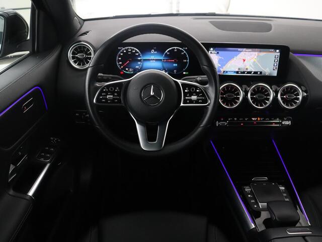 Mercedes-Benz EQA 250 Business Solution Luxury 67 kWh | SOH 94,2% | Half leder | Cruise control | Trekhaak | Stoelverwarming | Sfeerverlichting | Carplay | Camera | Park assist | Elektrische achterklep