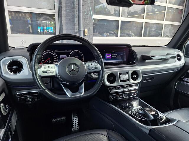 Mercedes-Benz G-KLASSE 500 | AMG Line | Schuifdak | Trekhaak | Burmester | Massage stoelen | DISTRONIC | 360° Camera | Multibeam LED | Memory pakket | Sfeerverlichting | Dodehoekassistentie