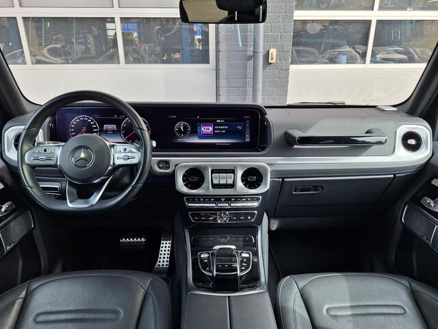 Mercedes-Benz G-KLASSE 500 | AMG Line | Schuifdak | Trekhaak | Burmester | Massage stoelen | DISTRONIC | 360° Camera | Multibeam LED | Memory pakket | Sfeerverlichting | Dodehoekassistentie