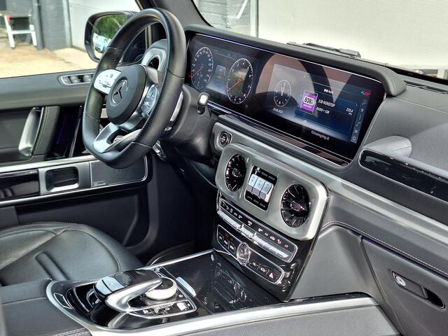 Mercedes-Benz G-KLASSE 500 | AMG Line | Schuifdak | Trekhaak | Burmester | Massage stoelen | DISTRONIC | 360° Camera | Multibeam LED | Memory pakket | Sfeerverlichting | Dodehoekassistentie