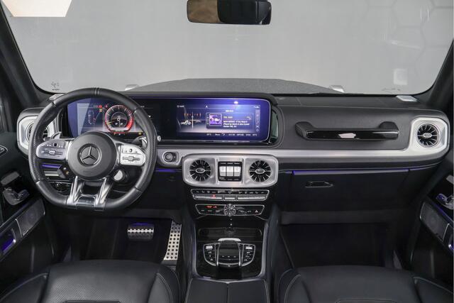 Mercedes-Benz G-KLASSE 63 AMG | MASSAGE | ADAPTIVE CRUISE | STOELVERKOELING & VERWARMING | PANORAMADAK | TREKHAAK | BURMESTER | SFEERVERLICHTING | 22 INCH | G63