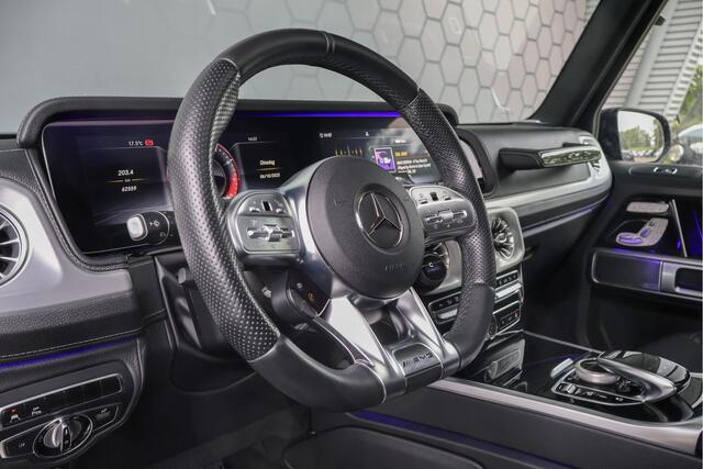 Mercedes-Benz G-KLASSE 63 AMG | MASSAGE | ADAPTIVE CRUISE | STOELVERKOELING & VERWARMING | PANORAMADAK | TREKHAAK | BURMESTER | SFEERVERLICHTING | 22 INCH | G63