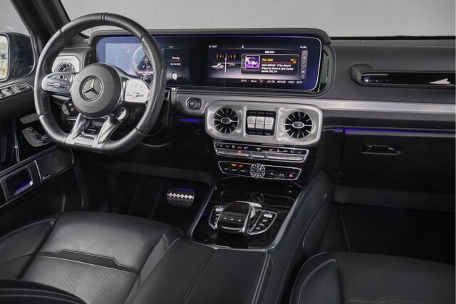 Mercedes-Benz G-KLASSE 63 AMG | MASSAGE | ADAPTIVE CRUISE | STOELVERKOELING & VERWARMING | PANORAMADAK | TREKHAAK | BURMESTER | SFEERVERLICHTING | 22 INCH | G63