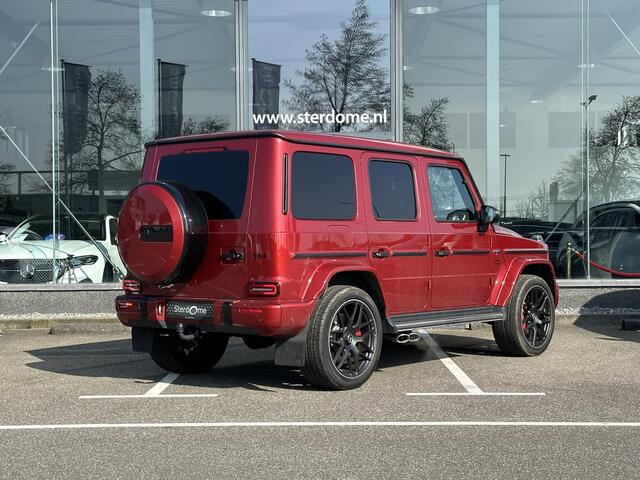 Mercedes-Benz G-KLASSE AMG 63 G63 AMG l ¤184.950,- ex. BTW l Rijassistentiepakket l Manufaktur l Burmester l 360* camera l G63 AMG VAN Schuif- Kanteldak l Nightpakket l Alarm l Grijs kenteken l
