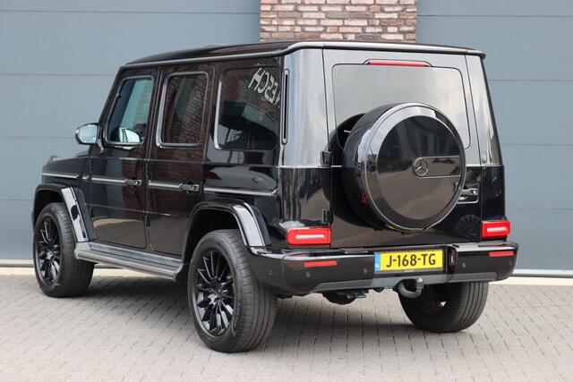 Mercedes-Benz G-KLASSE 500 V8 | Schuifdak | Distronic+ | Standkachel | Burmester | Massage | Leder Exclusief | Stoelventilatie | Trekhaak | Sfeerverlichting | Apple Carplay |