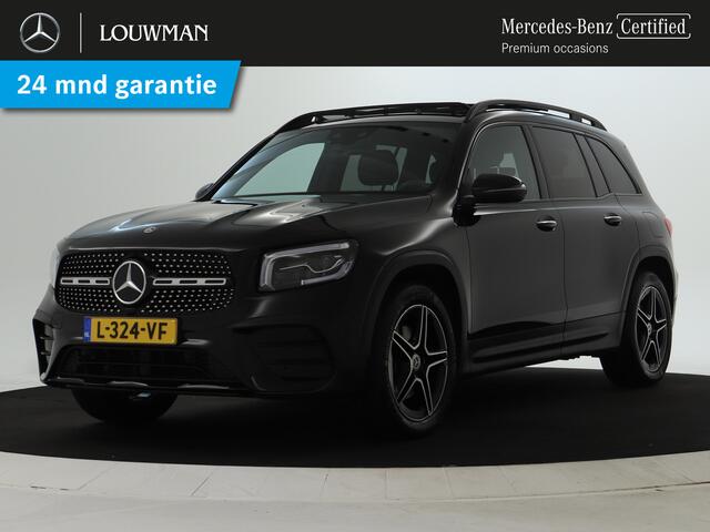 Mercedes-Benz GLB-Klasse 200 Business Solution AMG 7p. Panorama Schuif-Kanteldak | Memory stoelen | Achteruitrijcamera | Nightpakket | Trekhaak | 7 Persoons. Inclusief 24 maanden MB Certified garantie voor Europa.