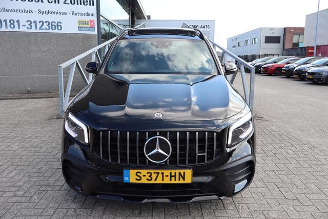 Mercedes-Benz GLB-Klasse AMG 35 4MATIC Night pakket/Panoramadak/Stoelverwarming/Sfeerverlichting/ABC Kleppensysteem/Achteruitrijcamera/Apple carplay/21'' licht metaal/Elektrische achterklep/Oranje gordels!