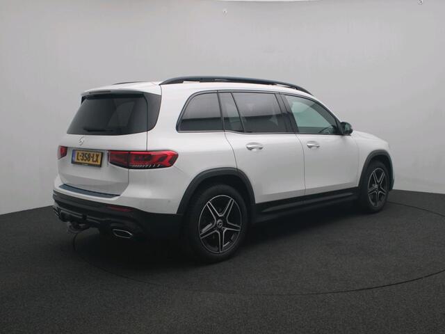 Mercedes-Benz GLB-Klasse 200 Business Solution AMG Premium Plus | Trekhaak | AMG Line | Night Pakket | Distronic | Panorama Schuifkanteldak | Parkeerpakket met achteruitrijcamera. Inclusief 24 maanden Mercedes-Benz Certified garantie voor Europa.