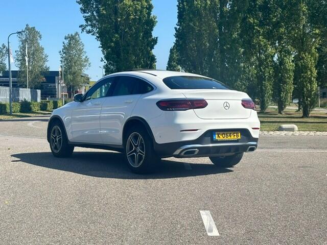 Mercedes-Benz GLC-KLASSE Coupé 200 4MATIC l AMG l Facelift l Schuif - Kanteldak l Camera l MBUX l Stoelverwarming l Parkeer pakket l LED l Elektr. bedienbare achterklep l Airconditioning l Stoelcomfort pakket l UNIEKE KM STAND.