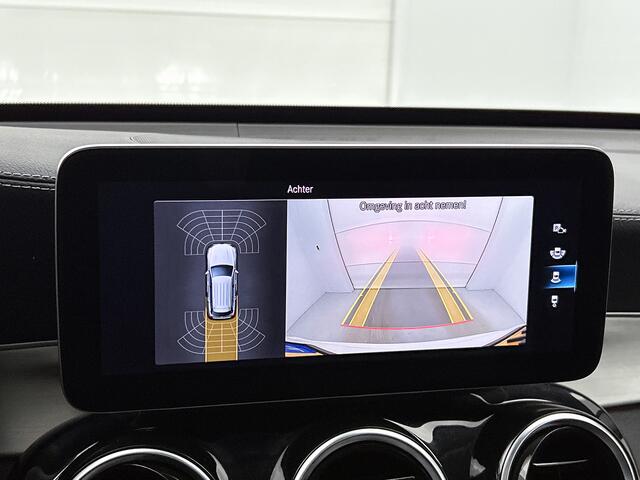 Mercedes-Benz GLC-KLASSE 300 e 4MATIC Business Solution AMG Panoramadak | 5 spaaks AMG lichtmetalen velgen | Treeplanken | Navigatie | Parking support | Inclusief 24 maanden MB Certified garantie voor Europa.