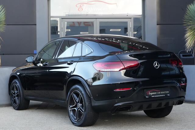 Mercedes-Benz Glc Coupé 300e 4MATIC AMG | PHEV | 320PK | Virtual Cockpit | Camera | 19'' | Een bijzonder fraaie combinatie van sportiviteit, luxe en efficiëntie. Deze Mercedes-Benz GLC Coupé 300e 4MATIC is uitgevoerd in de populaire AMG Line en combineert het elegante Coupé-design