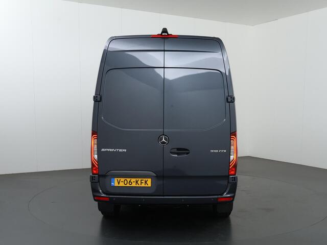 Mercedes-Benz SPRINTER 319 CDI | L2 H2 | Select | Aut. | EDITION | LM VELGEN | SPOILERPAKKET | TREEPLANKEN | ZONNEKLEP | Navigatie | Airco | Stoelverwarming | Achteruitrijcamera | Distronic | Dodehoekassistent | Geveerde Comfortstoel en bijrijdersbank | Trekhaakvoorbereiding 35