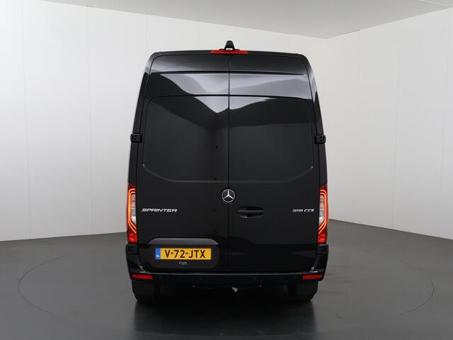 Mercedes-Benz SPRINTER 319 L2 H2 Select | Aut. | EDITION | LM VELGEN | SPOILERPAKKET | TREEPLANKEN | ZONNEKLEP | Geveerde Chauffeursstoel | Twee Schuifdeuren | Parkeercamera | Distronic Plus | Dodehoekassistent | Navigatie | LED met Grootichtassistent | Airco | 3-zits | Certifi