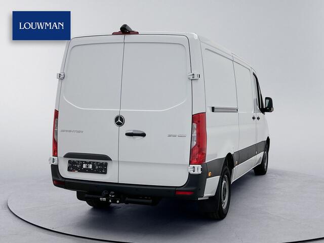 Mercedes-Benz SPRINTER 319 1.9 CDI L2H1 3500kg Navigatie 3500kg Trekhaak Betimmering Parkeerpakket