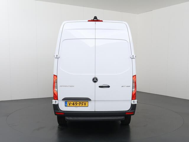 Mercedes-Benz SPRINTER 317 CDI | AUT. | L2 H2 | Pro | Navigatie | Spiegelpakket | Verwarmde Geveerde Comfort Chauffeursstoel en Bijrijdersbank | Achterdeuren 270 Graden | Airco | Cruisecontrol | Dodehoekassistent | Parkeerpakket met Achteruitrijcamera | Certified |