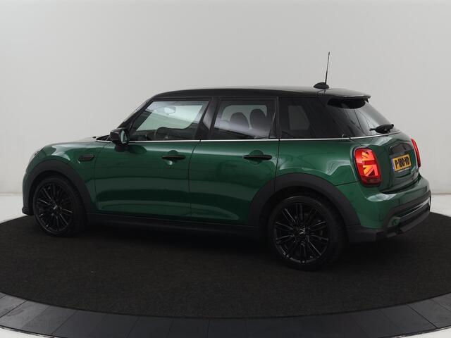 Mini COOPER 1.5 Business Edition | Harman/Kardon | Carplay | Verwarmde voorruit | Navigatie | Full LED | Half leder | Parkeerhulp | Climate control | Cruise control | Bluetooth | British Racing Green