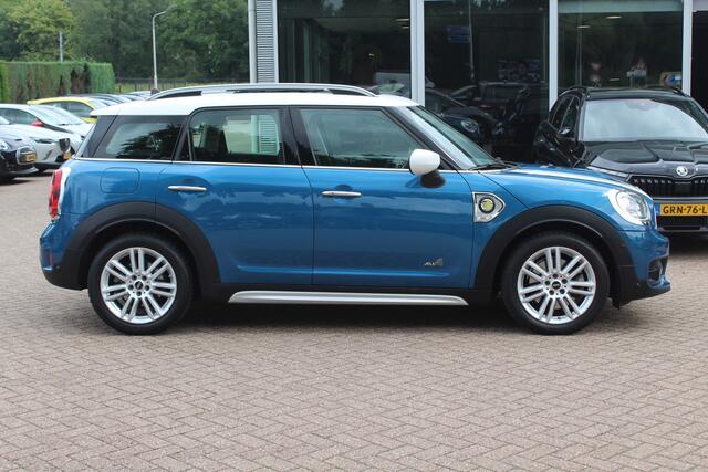 Mini COUNTRYMAN Mini 2.0 Cooper S E ALL4 Chili 27.637 km! / Panoramadak / Camera / Head-up / Apple CarPlay / Navigatie / 18'' / Sportstoelen / Stoelverwarming / DAB / Cruise Control