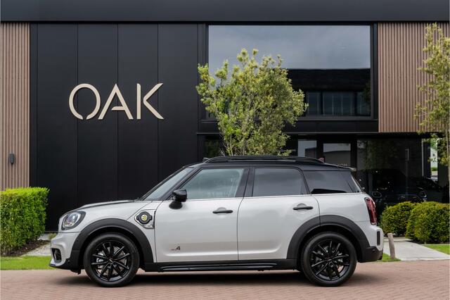 Mini COUNTRYMAN 1.5 Cooper SE Hybride ALL4 JCW-Trim | Navigatie | Panorama | Half Leder | Camera | Head-Up | 18"LM | White Silver