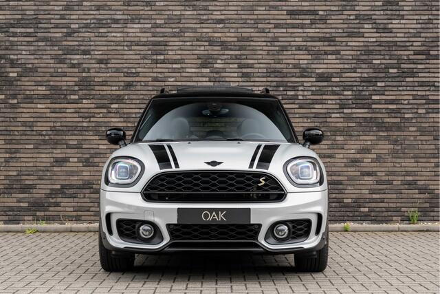 Mini COUNTRYMAN 1.5 Cooper SE Hybride ALL4 JCW-Trim | Navigatie | Panorama | Half Leder | Camera | Head-Up | 18"LM | White Silver