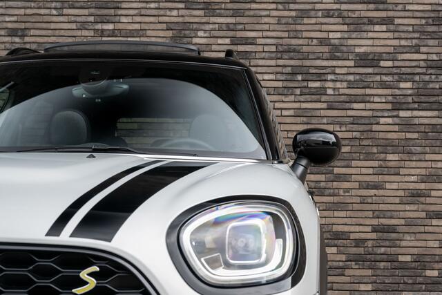 Mini COUNTRYMAN 1.5 Cooper SE Hybride ALL4 JCW-Trim | Navigatie | Panorama | Half Leder | Camera | Head-Up | 18"LM | White Silver