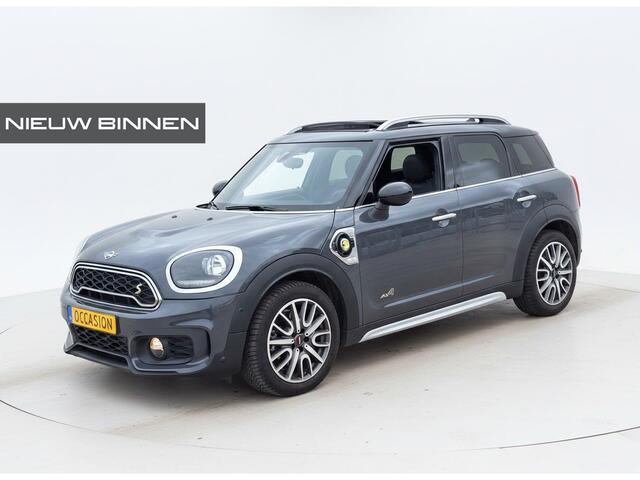 Mini COUNTRYMAN 1.5 Cooper S E ALL4 Salt John Cooper Works | Panoramadak | Stoelverwarming | Cruise Control | Apple Carplay | Navigatie | Parkeersensoren | Climate Control | Leer | Mini Driving Modes |
