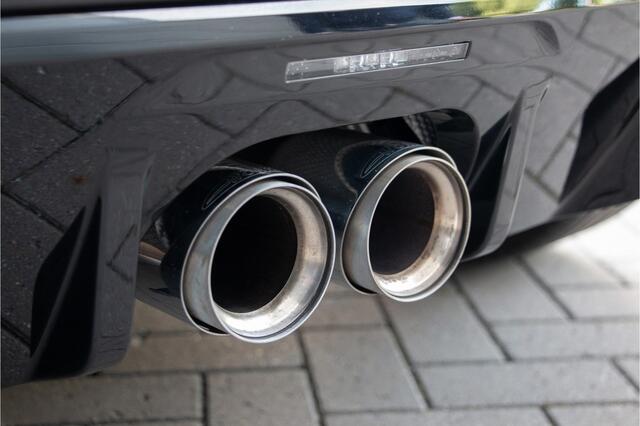 Mini John Cooper Works 3-Deurs 2.0 231PK | Pro Exhaust | Pano | ACC | HUD | Camera | KeyLess | Stuur/StoelVerwarming | Sportstoelen | Ambient Light | Alarm | British Racing Green