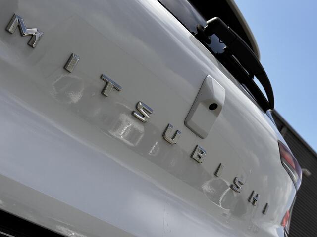 Mitsubishi ASX 1.8 HEV AT Intense / ¤ 3.000,- Voordeel op de nieuwprijs! / 8 Jaar Fabrieksgarantie / Achteruitrijcamera / Navigatie via Apple Carplay & Android Auto / Keyless Entry & Start / Verwarmde Voorstoelen / Cruise- en Climate Control /