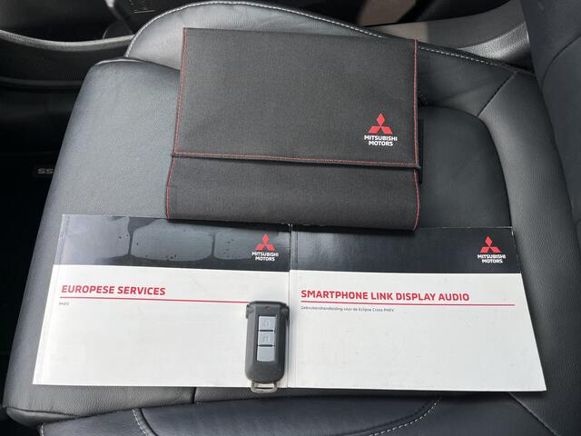 Mitsubishi ECLIPSE Cross 2.4 PHEV Instyle Automaat / Trekhaak (Trekgewicht 1.500kg) / Elektrisch Glazen Schuif- en Kanteldak / Head-Up Display / 360° Camera / Stuur- en Stoelverwarming voor en achter / Apple Carplay & Android Auto / Adaptieve Cruise Control / Keyless Entry 