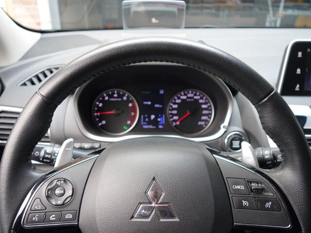 Mitsubishi ECLIPSE Cross 1.5 CVT First Edition | trekhaak | all-season banden