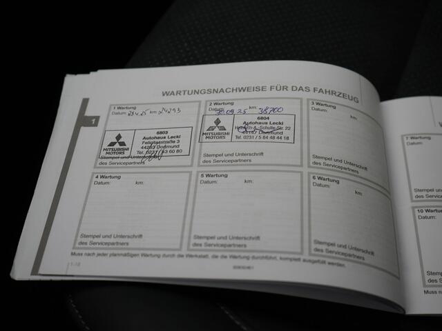 Mitsubishi ECLIPSE Cross 2.4 Black Edition Plug In Hybrid 188pk Dealer O.H. PHEV | Trekhaak | Adaptive Cruise | 360 Camera | Alcantara Sportstoelen & Stuur Verwarmd | Keyless | Blis | Navigatie Via TomTom | Apple Carplay | DAB |