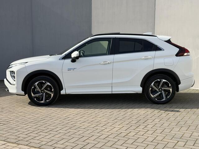 Mitsubishi ECLIPSE Cross 2.4 PHEV Instyle / Fabrieksgarantie tot 05-2030 / Dealer Onderhouden / Schuif Kantel Dak / Camera / Navigatie / Adaptieve Cruise / ApplecarPlay & Android Auto / Lederen Bekleding / Stoel Verwarming / Elektr. Stoelen / Stoel Verwarming /