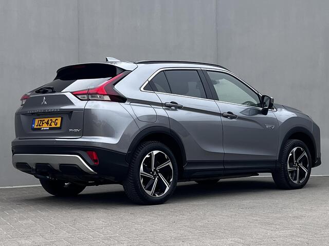 Mitsubishi ECLIPSE Cross 2.4 PHEV Intense+ / Fabrieksgarantie tot 02-2030 mogelijk / Dealer onderhouden / Navigatie / 1.500 kg afneembare trekhaak / Elektrische bestuurdersstoel / Navigatie / Apple Carplay Android / Stoelverwarming / 18" LM wielen + All Season banden /