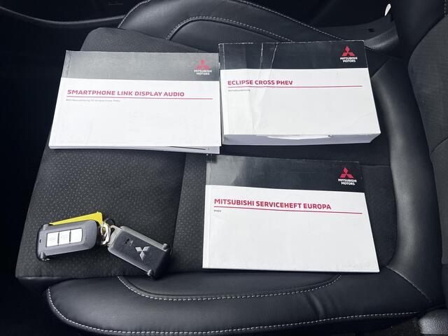 Mitsubishi ECLIPSE Cross 2.4 PHEV Intense+ / Fabrieksgarantie tot 02-2030 mogelijk / Dealer onderhouden / Navigatie / 1.500 kg afneembare trekhaak / Elektrische bestuurdersstoel / Navigatie / Apple Carplay Android / Stoelverwarming / 18" LM wielen + All Season banden /