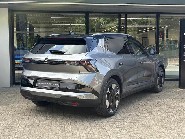 Mitsubishi ECLIPSE Cross Intense 87 kWh NIEUW UIT VOORRAAD LEVERBAAR | Warmtepomp | Apple CarPlay & Android Auto | Adaptieve Cruise Control | Verwarmbare voorstoelen | Elektrisch bedienbare achterklep | Navigatiesysteem | 8 jaar fabrieksgarantie