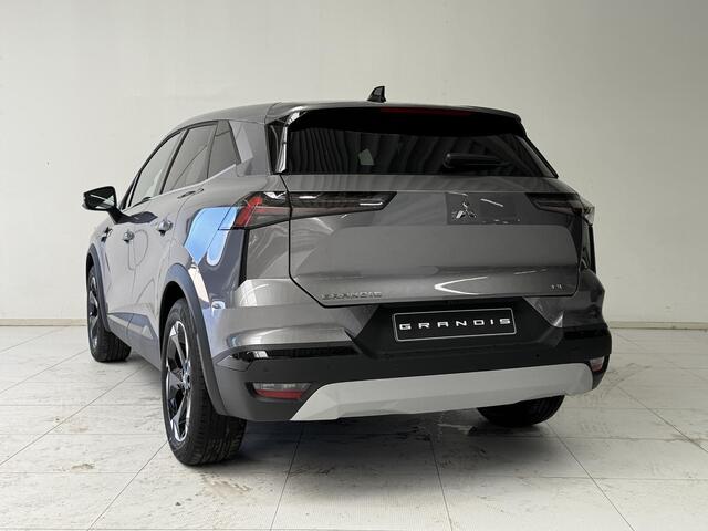 Mitsubishi GRANDIS 1.8 HEV Intense+ NIEUW UIT VOORRAAD LEVERBAAR | Verwarmbare voorstoelen | Parkeersensoren voor- en achter | Sfeerverlichting | Regensensor | Adaptieve Cruise Control | Verwarmbaar Stuurwiel | Apple CarPlay & Android Auto | 8 jaar fabrieksgarantie