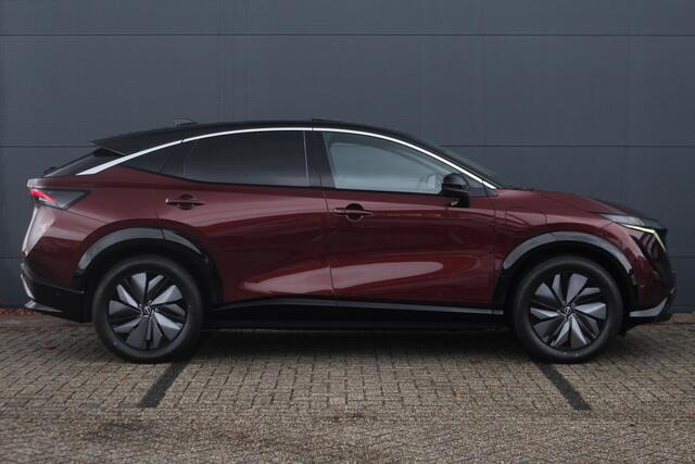 Nissan Ariya Evolve 91 kWh 240pk | Bose Audio | Draadloze Apple Carplay & Android Auto | Afneembare Trekhaak | Elektrisch Verstelbare Stoelen | Stoel/Stuurwiel Verwarming | Nieuw!