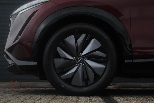 Nissan Ariya Evolve 91 kWh 240pk | Bose Audio | Draadloze Apple Carplay & Android Auto | Afneembare Trekhaak | Elektrisch Verstelbare Stoelen | Stoel/Stuurwiel Verwarming | Nieuw!