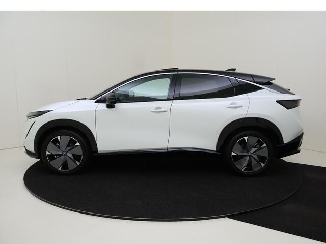 Nissan Ariya Evolve 87kWH 242PK | Schuif/kanteldak | Leder | Draadloze Apple Carplay & Android Auto | Elektrisch Verstelbare Stoelen | Stoel/Stuurwiel Verwarming | 20'' Inch Velgen | Tot ¤20.000 korting