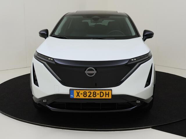 Nissan Ariya Evolve 87kWH 242PK | Schuif/kanteldak | Leder | Draadloze Apple Carplay & Android Auto | Elektrisch Verstelbare Stoelen | Stoel/Stuurwiel Verwarming | 20'' Inch Velgen | Tot ¤20.000 korting
