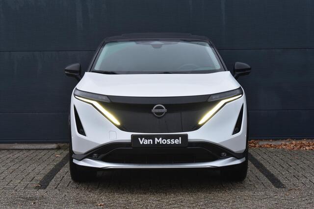 Nissan Ariya e-4ORCE Evolve+ 91 kWh 400pk | Schuif/kanteldak | Leder | Draadloze Apple Carplay & Android Auto | Elektrisch Verstelbare Stoelen | Stoel/Stuurwiel Verwarming | Voorspoiler |