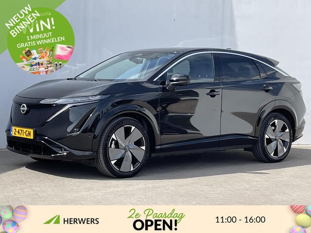 Nissan Ariya Evolve 91 kWh Cruise control adaptief / DAB / Elektrisch glazen panorama-dak / Privacy glass / Stuurwiel verwarmd / Rondomzichtcamera / Stoelverwarming voor en achter / Apple Carplay & Android Auto /