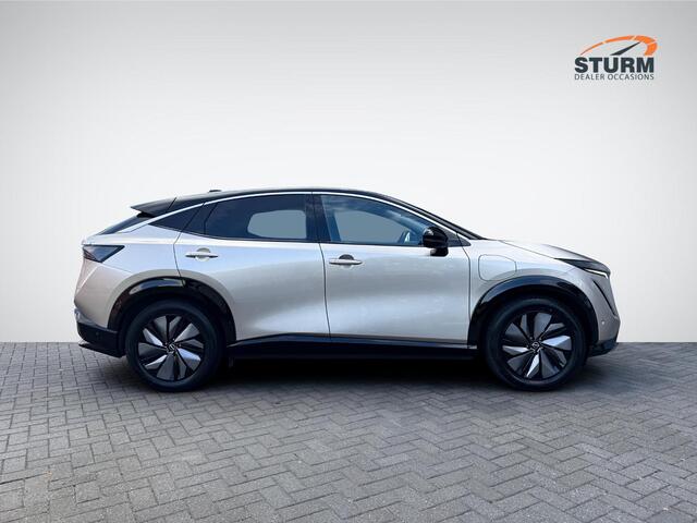 Nissan Ariya Evolve 91 kWh NL-Auto + 1e Eigenaar! | Panoramadak | Stoelverwarming + -ventilatie | BOSE Audio | Geheugenstoel | Head-Up Display | Rijklaarprijs!