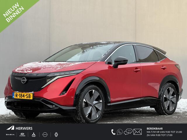 Nissan Ariya Evolve 91 kWh / Warmtepomp / Stuur- & Stoelverwarming / Voorruitverwarming / Geventileerde Voorstoelen / Binnenspiegel Camera / Schuif & Kanteldak / Head-Up Display / Bose Premium Audio / Adaptieve Cruise Control / Apple Carplay & Android Auto /