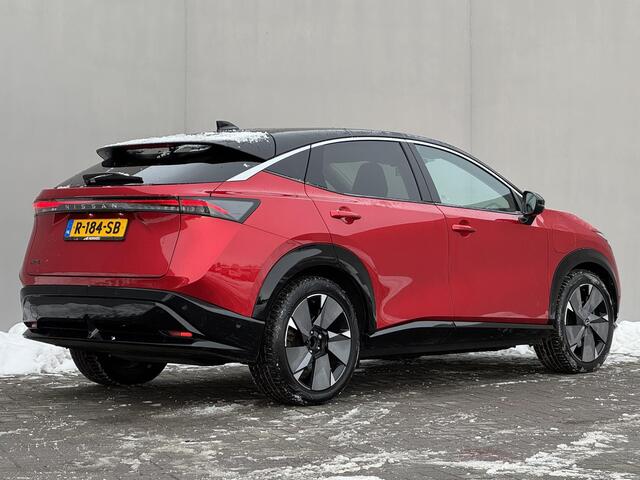 Nissan Ariya Evolve 91 kWh / Warmtepomp / Stuur- & Stoelverwarming / Voorruitverwarming / Geventileerde Voorstoelen / Binnenspiegel Camera / Schuif & Kanteldak / Head-Up Display / Bose Premium Audio / Adaptieve Cruise Control / Apple Carplay & Android Auto /