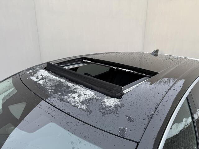 Nissan Ariya Evolve 91 kWh / Warmtepomp / Stuur- & Stoelverwarming / Voorruitverwarming / Geventileerde Voorstoelen / Binnenspiegel Camera / Schuif & Kanteldak / Head-Up Display / Bose Premium Audio / Adaptieve Cruise Control / Apple Carplay & Android Auto /